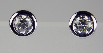 0.20ct diamond stud earrings in 18ct white gold - 0.20ct pair of diamonds in G colour VS clarity rubover set in 18ct white gold