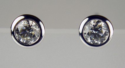 0.37ct diamond earstuds in 18ct white gold - 0.37ct pair of round brilliant cut diamonds in G colour VS clarity rubover set in 18ct white gold.
