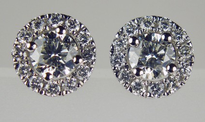 Diamond cluster earstuds in 18ct white gold - 0.55ct total diamond weight, pretty flower cluster earstuds in 18ct white gold. Diamonds are G colour VS clarity.
