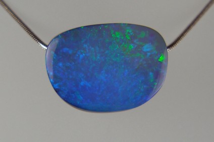Boulder opal pendant - Spectacular vibrant, 35.11ct boulder opal drilled bead pendant, 24 x 17mm. From Queensland, Australia. This photograph doesn't do this opal justice!
