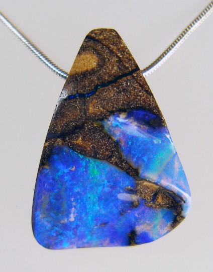 Boulder Opal Pendant - 43.81ct boulder opal drilled bead pendant. 24 x 32mm. From Queensland, Australia. Vibrant turquoise, green and blue colours shine out against the brown banded ironstone matrix in this stunningly beautiful and unique pendant.
