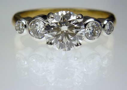 Diamond Ring in platinum & 18ct yellow gold - 5 Stone Diamond Ring 1.32ct G/SI2 (GIA certificated) diamond set with 0.5ct diamonds in platinum and 18ct yellow gold.
