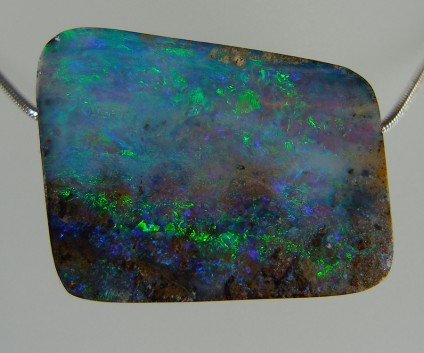 Boulder opal bead pendant - Spectacular and vibrant boulder opal from Queensland, Australia. 70.06ct boulder opal drilled bead pendant. 32 x 27mm. This photo doesn't do the opal justice, it is simply stunning.