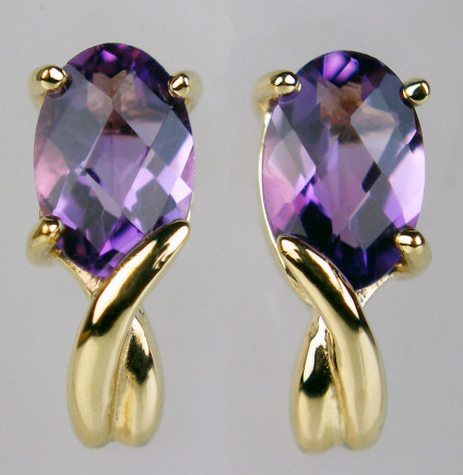 Amethyst chequerboard cut earstuds in 9ct yellow gold - Oval chequerboard cut amethysts set in 9ct yellow gold. These match a pendant on our site.