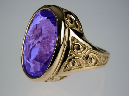Amethyst ring in gold - Amethyst & rose gold ring. Amethyst was inherited by client, repolished and set in a rose gold mount, reproducing the design of the original, damaged and badly worn Victorian rose gold setting.
