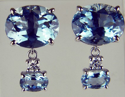 Aquamarine & diamond earrings - Beautiful pair of earrings consisting of 6.93ct fine quality mid blue oval cut aquamarines set with 0.12ct of diamonds in 18ct white gold