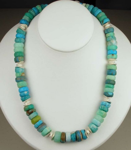 Turquoise miscellany gemstone bead necklace - Rough hewn button bead necklace with assorted natural gemstones in shades of turquoise, blue and green with silver beads and clasp.  Gemstone varieties include turquoise, amazonite, chrysoprase, chrysocolla, Andean opal, Finnish Jade (variety of serpentine) & hemimorphite.