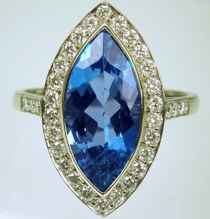 Aquamarine & Diamond Ring in Platinum - Aquamarine & diamond ring. 3.29ct marquise cut deep blue aquamarine set with 50 points of E/VS diamonds in platinum.
