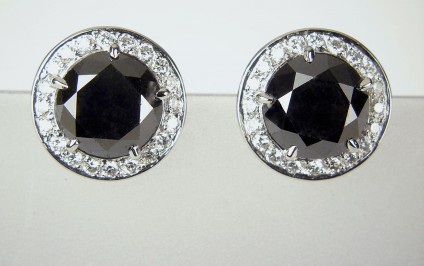 Black Diamond Earrings - Black diamond earrings - Earrings set with a matched pair of black diamonds totalling 7.25ct and 0.6ct of white diamonds in platinum.
