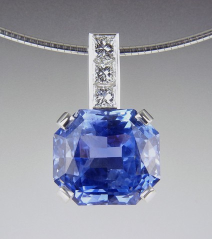 Sapphire & Diamond Pendant - Blue sapphire & diamond pendant in 18ct white gold.  Set with exceptional quality GIA certificated (untreated) 13ct cornflower blue Sri Llankan sapphire.
