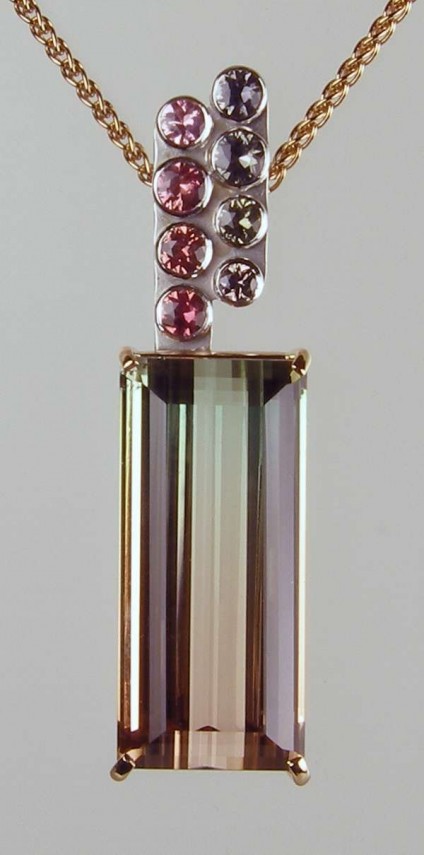 Watermelon tourmaline & sapphire pendant in rose & white gold - Exceptionally high clarity, 38.34ct watermelon tourmaline set with 1.57ct of round brilliant cut sapphires in 18ct rose and white gold, suspended from a 16-18" adjustable 18ct rose gold spiga chain