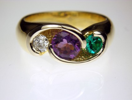 Amethyst, Diamond & Emerald Ring in 18ct yellow gold - Ring designed for customer using her children's birthstones. 
