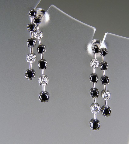 Black & White Diamond Earrings in 18ct white gold - Black & white diamond earrings in 18ct white gold set with 0.67ct black diamonds & 0.29ct white diamonds.
