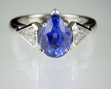 Sapphire & Diamond Ring in Platinum - Pear cut blue sapphire ring with matched pair of kite cut diamonds, ring set in platinum.
