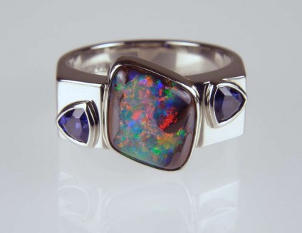 Boulder opal and sapphire ring in palladium - 2.52ct boulder opal set with 0.62ct sapphire trillions in palladium