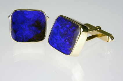 Boulder Opal Cufflinks  - Boulder opal cufflinks in 9ct yellow gold, set with 23.42ct Queensland boulder opal pair.
