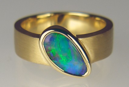 Boulder opal ring in 18ct brushed gold - Stunning boulder opal set in brushed 18ct yellow gold. Ring size Q (8 1/4). Due to the difficulties of resetting opals in rubover settings, this ring cannot be resized down.