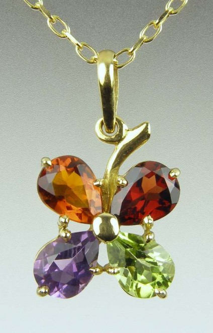 Flower Pendant in Vivid Coloured Gems - Pear cut Brazilian gemstones totalling 1ct in peridot, garnet, citrine & amethyst, set in 18ct yellow gold on a matching chain.