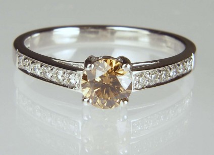 Cinnamon diamond ring - 0.52ct round brilliant cut cinnamon diamond set with 0.15ct white diamonds in 18ct white gold