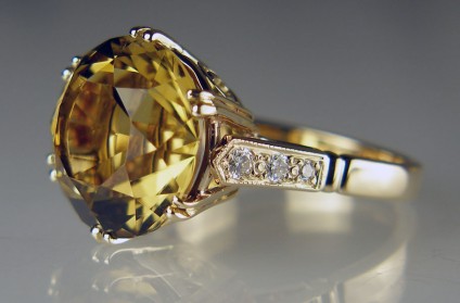 Citrine & diamond ring in yellow gold - 9.17ct round fancy cut citrine (cut by Ian Hardy Robertson Shand DFC DSO) set with diamonds in 9ct yellow gold