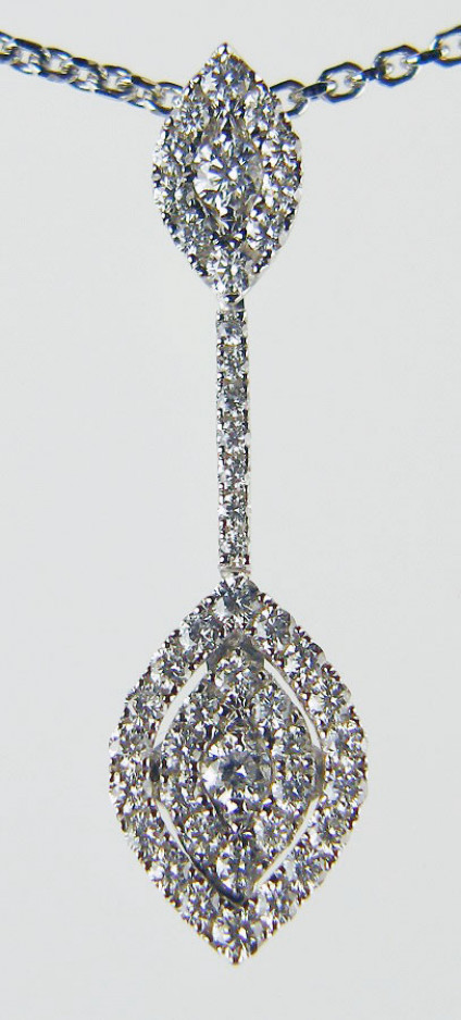 Delicate diamond drop pendant - 0.45ct round brilliant cut G colour VS clarity diamonds set in 18ct white gold. This pendant is in our twenty year anniversary sale and now costs £418.50. The reduced price does not include a chain.