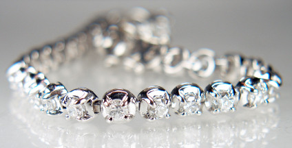 Diamond bracelet in platinum - 4.100ct of G colour VS clarity round brilliant cut diamonds set in platinum bracelet. Bracelet has a secure clasp with two additional safety clips. Our diamond tennis bracelets are very solidly made and will withstand years of continuous wear. Nothing flimsy about our bracelets!  This bracelet is discounted in out 20 year anniverasry sale and now costs £3910