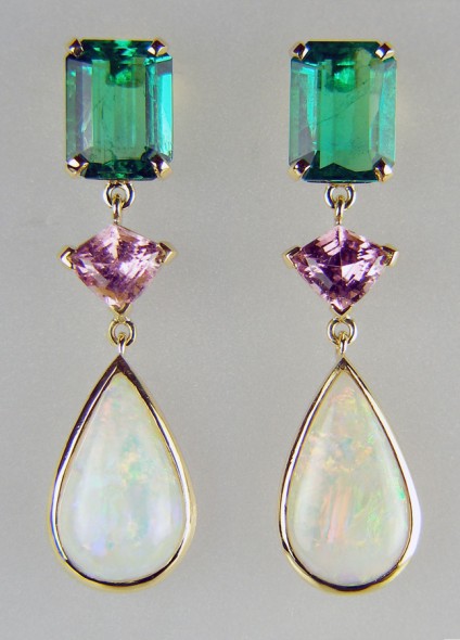 Emerald, tourmaline & opal earrings in yellow gold - Stunning pair of drop earrings set with a 3.17ct emerald cut pair of superb quality Colombian emeralds, a 1.17ct shield cut pair of pink tourmalines and 3.27ct pair of cabochon pear opals from Coober Pedy, all mounted in 18ct yellow gold