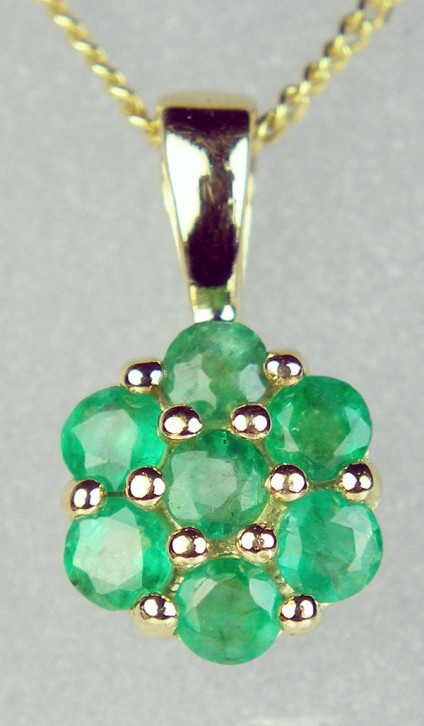 Emerald cluster pendant in 9ct yellow gold - seven stone emerald cluster pendant in 9ct yellow gold 