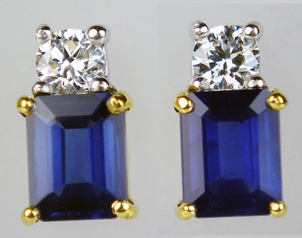 Rectangular sapphire & diamond earstuds in 18ct white & yellow gold - Beautiful pair of emerald cut blue sapphires set with diamonds in 18ct white & yellow gold. Earstuds are 8mm long by 4mm wide. Sapphire total weight 1.68ct, diamonds 0.16ct.