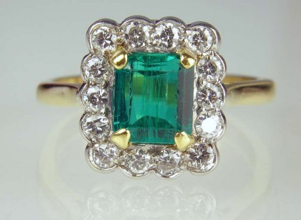 Emerald & diamond ring - Estate piece.  Manufactured by Mappin & Webb. 1.25ct emerald set with 0.56ct diamonds in 18ct yellow gold and platinum.