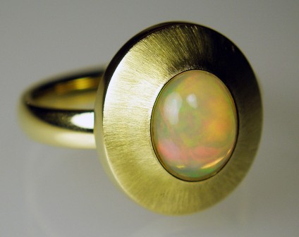 Ethiopian opal ring in 18ct gold - 1.34ct Ethiopian opal cabochon mounted in 18ct yellow gold