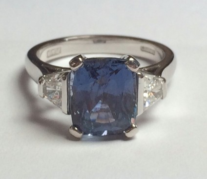 Grey-blue Sapphire & Diamond Ring - 4.28ct rectangular cushion cut grey-blue sapphire set with a pair of 0.48ct F-G colour VS2 clarity diamonds set in 18ct white gold