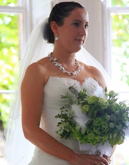 Jade on her wedding day wearing her Just Gems designed pearl necklace - Beautiful keishi cultured pearls mounted with a silver clasp give a dramatic and lustrous glow to the beautiful bride on her wedding day.  Just Gems has a wide range of similar pearls in stock and can create a piece specially to complement your wedding dress, make-up and hair