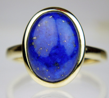 Lapis cabochon oval ring in 9ct yellow gold - Oval cabochon Afghan lapis lazuli rubover set in 9ct yellow gold