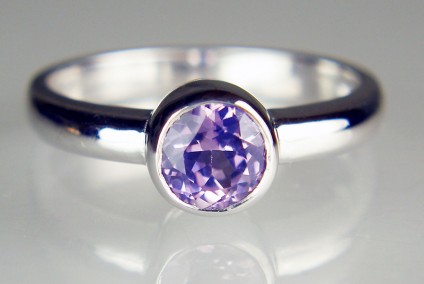 Lilac sapphire ring in 18ct white gold - 5.4mm round 0.96ct lilac sapphire rubover set in 18ct white gold ring
