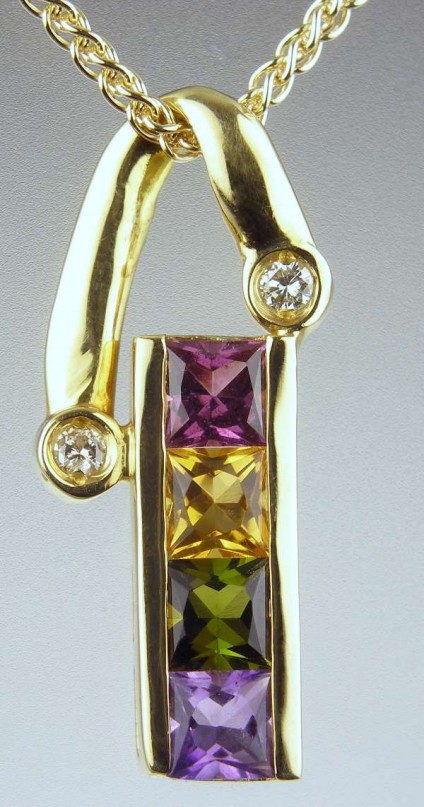 Brazilian gemstone pendant - 1ct of Brazilian gemstones (tourmaline - green and red; amethyst; citrine) set with 2 points of diamonds in 18ct yellow gold with matching chain