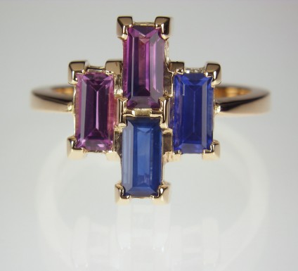 Sapphire ring in Rose Gold - Baguette cut sapphires in shades of blue and pink set in 18ct rose gold.