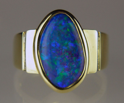 Boulder opal & diamond ring in 18ct yellow gold - 4.97ct boulder opal from Queensland set with 2 points of diamond in 18ct yellow gold ring