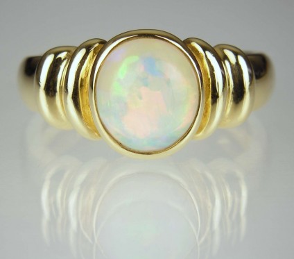 Opal Ring - Opal round cabochon ring in 18ct yellow gold