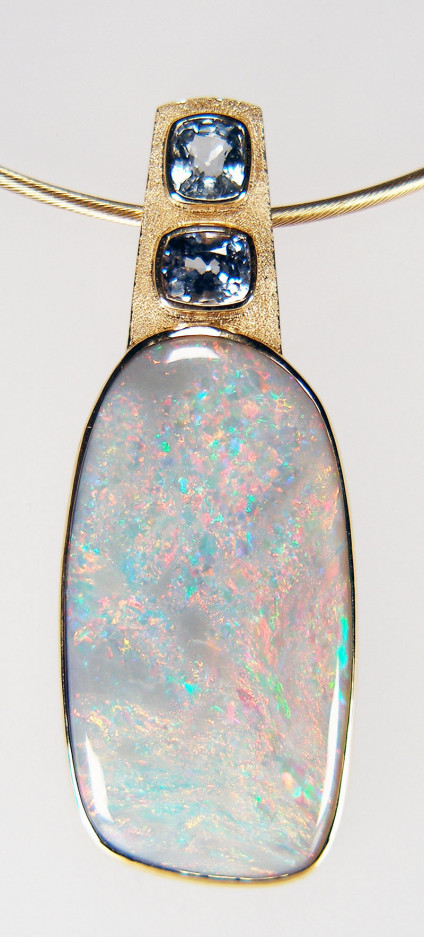 Black opal & grey spinel necklace in 18ct yellow gold - 22.38ct fine rubover set Australian black opal. body tone N7, set with 1.24ct cushion cut grey spinels in 18ct yellow gold pendant, suspended from an 18ct yellow gold cable