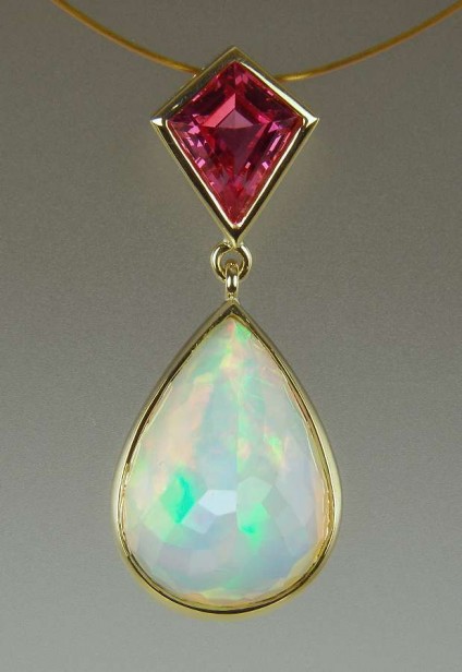 Opal & Spinel Pendant - Vivid coloured faceted pear cut solid Ethiopian opal set with a kite cut spinel from Mahenge, Tanzania, in 18ct yellow gold