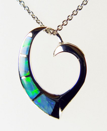 Silver heart pendant inlaid with black opal - Pretty silver pendant inlaid with Australian solid black opal. The pendant has been rhodium plated to resist tarnishing and is suspended from a rhodium plated silver chain of adjustable length 15-22".