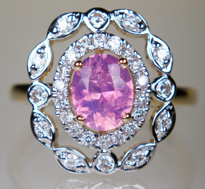 Opalescent pink sapphire & diamond ring in 14ct white & yellow gold - Gorgeous and mystic, opalescent Sri Lankan pink sapphire oval weighing 1.18ct, the sapphire is unheated, surrounded by a 0.58ct double halo of round brilliant cut white diamonds. The gems are mounted in 14ct white gold and the shank is in 14ct yellow gold. This ring is feminine and ethereal, and truly exquisite.