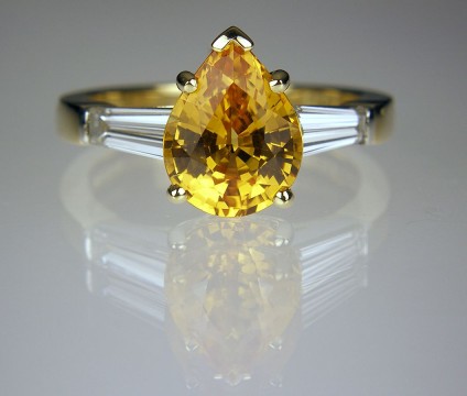 Sapphire & diamond ring in platinum - Intense golden orange Madagascan sapphire & diamond ring in 18ct gold & platinum.
