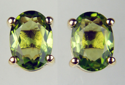 Peridot oval earstuds in 9ct yellow gold - 1.55ct oval peridot earstuds in 9ct yellow gold. Peridots are 7x5mm.