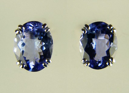 Tanzanite earstuds - 3.5ct pair of oval faceted tanzanites 9 x 7mm, mounted as earstuds in 18ct white gold
