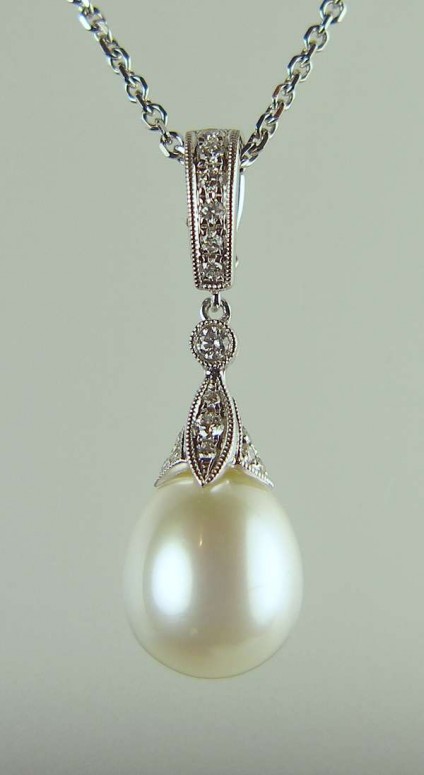 Pearl & diamond pendant - 0.25ct diamond and south sea pearl pendant with delicate millegrain edging in 18ct white gold and suspended from  20" 18ct white gold chain