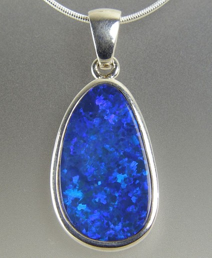 Boulder opal pendant in silver - Boulder opal pendant in silver on silver chain. Pendant 12x29mm.
