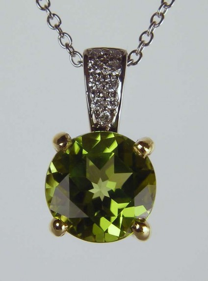Peridot & diamond pendant - 2.03ct round peridot set with 0.06ct H/VS diamonds in 18ct yellow and white gold suspended from a 16-18" adjustable 18ct white gold chain