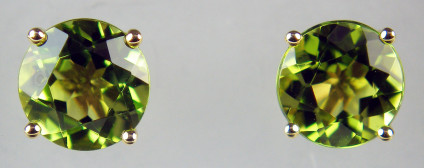 7mm peridot round earstuds in 9ct yellow gold - 7mm round pair of peridots weighing 2.85ct and claw set in 9ct yellow gold earstuds